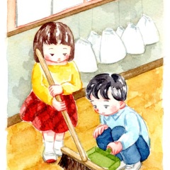 小学校の教室で掃除する生徒